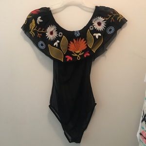 Off the shoulder mesh body suit